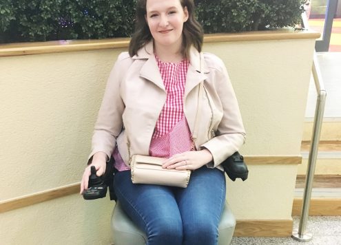 Shona Louise in her powerchair