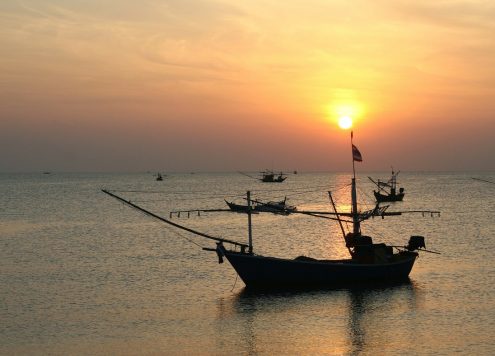 South Asia, boat on the water at sunset