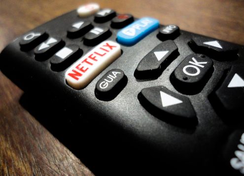 TV remote with a Netflix button.