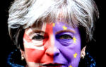 Theresa May with her face painted half with the English flag, half with the EU flag.