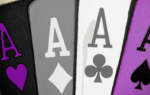 Four Ace playing cards in the colours of the asexual flag - purple, grey, black and white